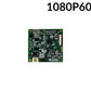 Electronic circuit board with various components on a green background