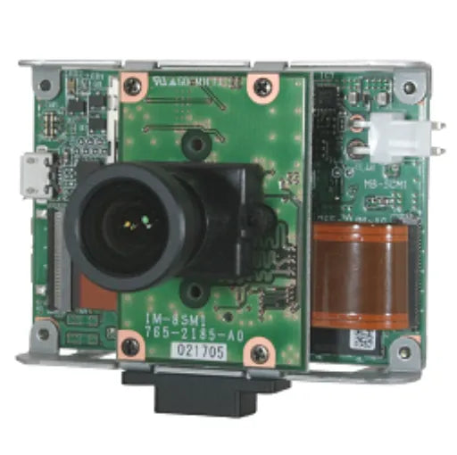 SCM-2M1 camera module with green circuit board and black lens on a white background